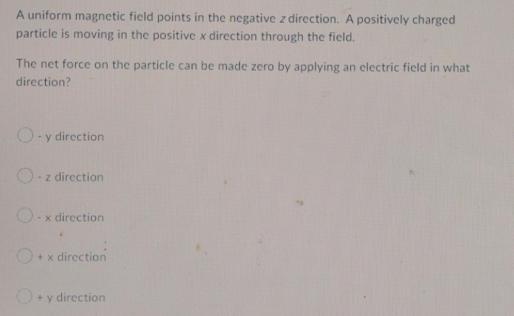 A Uniform Magnetic Field Points In The Negative Z Direction A Positively Charged Particle Is Moving In The Positive X D 1