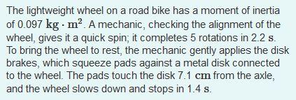 The Lightweight Wheel On A Road Bike Has A Moment Of Inertia Of 0 097 Kg Mo A Mechanic Checking The Alignment Of The 1