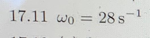 17 11 Two Uniform Circular Plane Wheels Of Equal Mass 1 00 Kg Are Mutually Pivoted About A Horizontal Axis A Perpendic 2
