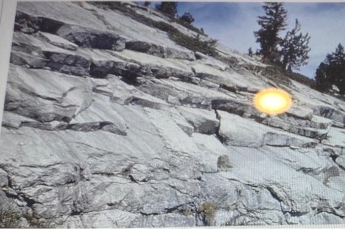 A Rockslide B Slump C Landslipe D Creep 2 The Rock In This Photo Shows An Example Of Weathering Caused By 2