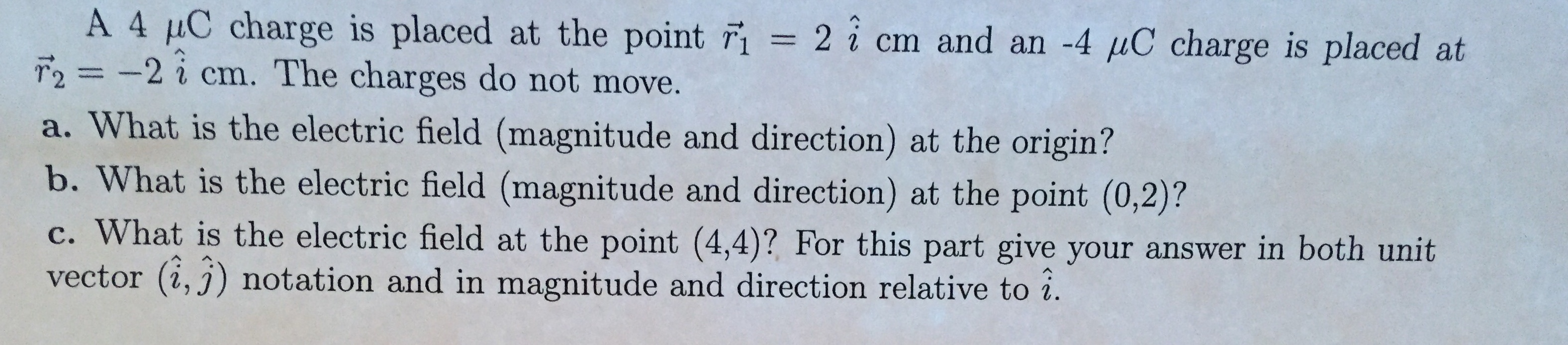 A 4 Uc Charge Is Placed At The Point Ri 2 I Cm And An 4 Mc Charge Is Placed At F2 2 I Cm The Charges Do Not Move 1