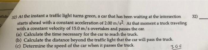 32 Midt 32 At The Instant A Traffic Light Turns Green A Car That Has Been Waiting At The Intersection Starts Ahead Wi 1